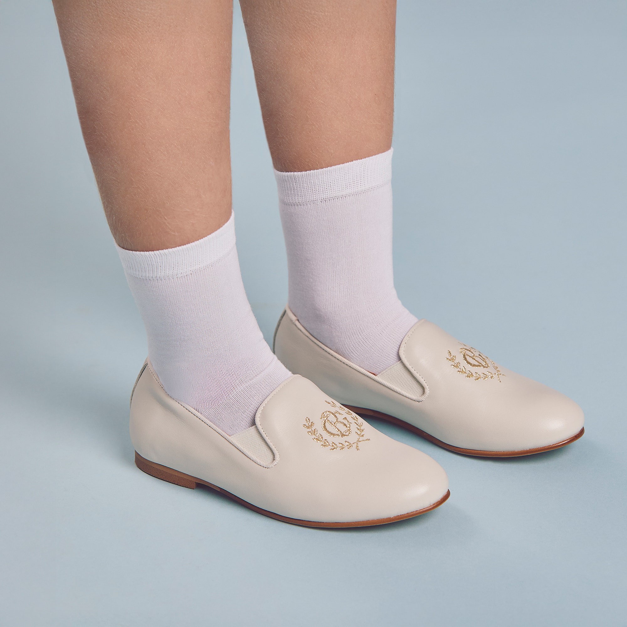 Boys Ivory Leather Loafers with Embroidered Gold Crest Logo - View 2