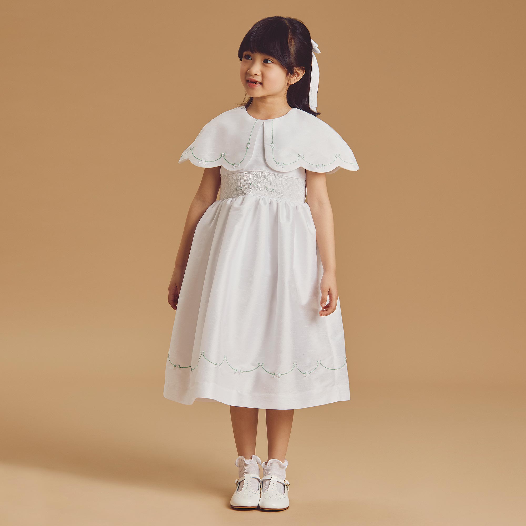 Girls White Hand-Smocked Dupion Dress with Cape Collar - View 2